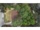 Aerial view showing the property lines, house, yard, and surrounding greenery at 6372 Valley Dale Dr, Riverdale, GA 30274