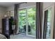 Relax on this home's private balcony, boasting mature trees and peaceful surroundings at 1192 Cleburne Ne Ave, Atlanta, GA 30307