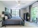 This bedroom has tons of natural light and a balcony at 1192 Cleburne Ne Ave, Atlanta, GA 30307