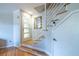 Modern foyer with a minimalist staircase and ample natural light at 1192 Cleburne Ne Ave, Atlanta, GA 30307
