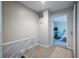 Hallway leads to bedroom with doorway view, light grey walls, carpet floor at 1192 Cleburne Ne Ave, Atlanta, GA 30307