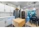 Open floor plan features white kitchen with dining area and stainless steel appliances at 1192 Cleburne Ne Ave, Atlanta, GA 30307