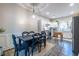 Open kitchen featuring stainless steel appliances, white cabinets, and a dining table for eating at 1192 Cleburne Ne Ave, Atlanta, GA 30307