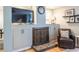 Comfortable living room with a cozy fireplace, built-in shelves, and ample seating space at 1192 Cleburne Ne Ave, Atlanta, GA 30307