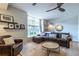 Relaxing living room area featuring a large window with a view, comfortable seating, and modern decor at 1192 Cleburne Ne Ave, Atlanta, GA 30307
