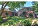 Brick home has a meticulously maintained backyard with a screened porch and a water feature at 2160 Kensington Gates Nw Dr, Kennesaw, GA 30152
