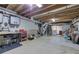 Unfinished basement featuring exposed ductwork, storage cabinets, and wooden ceiling at 2160 Kensington Gates Nw Dr, Kennesaw, GA 30152