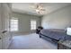 Bedroom featuring a full bed, two windows and natural lighting at 2160 Kensington Gates Nw Dr, Kennesaw, GA 30152