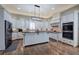 Spacious kitchen with stainless steel appliances, white cabinetry, granite countertops, and hardwood flooring at 2160 Kensington Gates Nw Dr, Kennesaw, GA 30152