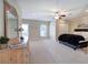 Spacious main bedroom with a ceiling fan, walk-in closet, and beautiful sunlight at 2160 Kensington Gates Nw Dr, Kennesaw, GA 30152