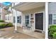 Inviting home entrance with chairs and a welcome sign at 261 Venture Path, Hiram, GA 30141