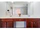 Bathroom featuring double sinks, a vanity, and a large mirror at 1147 Scenic Park Trl, Lawrenceville, GA 30046