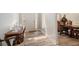 Bright foyer featuring beautiful floors and decor, leading into the dining area at 1147 Scenic Park Trl, Lawrenceville, GA 30046