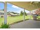 Large covered patio with a grill overlooking the backyard at 1147 Scenic Park Trl, Lawrenceville, GA 30046