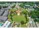 Aerial view of park with manicured lawns, trees, walking trails, and green space at 260 W Peachtree St, Norcross, GA 30071