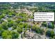 Aerial view of home near historic downtown Norcross, Lillian Webb Park and Thrasher Park at 260 W Peachtree St, Norcross, GA 30071