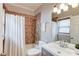 Bathroom with tub, shower, and natural light at 260 W Peachtree St, Norcross, GA 30071
