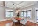 Dining room features tray ceilings, recessed lights and large windows at 260 W Peachtree St, Norcross, GA 30071