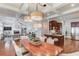 Open-concept dining and living areas are enhanced by coffered ceilings and hardwood floors at 260 W Peachtree St, Norcross, GA 30071