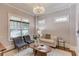 Cozy living room with ample natural light, comfortable seating, and stylish decor at 260 W Peachtree St, Norcross, GA 30071