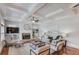 Bright living room featuring a cozy fireplace, built-in shelves, and stylish decor at 260 W Peachtree St, Norcross, GA 30071
