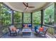 Cozy porch seating area with a fire pit, creating a perfect space for outdoor entertainment at 260 W Peachtree St, Norcross, GA 30071