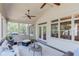 Cozy sunroom features multiple windows and ceiling fan at 260 W Peachtree St, Norcross, GA 30071