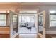 Sunroom with double doors leading to living area at 260 W Peachtree St, Norcross, GA 30071