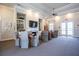 Amenity room featuring comfortable seating, a fireplace, and a large screen TV for residents to enjoy at 3209 Telhurst Way, Buford, GA 30519