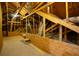 An unfinished attic with exposed wood framing, ductwork, and insulation at 3209 Telhurst Way, Buford, GA 30519