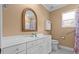 Bathroom features a large mirror, vanity, and a walk-in shower at 3209 Telhurst Way, Buford, GA 30519