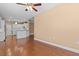 Inviting living area showing open floor plan and kitchen in the background at 3209 Telhurst Way, Buford, GA 30519