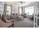 Inviting living room with neutral tones, comfortable seating, and plenty of natural light at 3209 Telhurst Way, Buford, GA 30519
