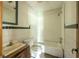 Bathroom features a shower-tub combination, toilet, and vanity at 400 Mccart Rd, Mcdonough, GA 30252