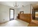 Dining Room featuring chandelier and wooden paneling at 400 Mccart Rd, Mcdonough, GA 30252