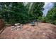 Outdoor recreational area featuring a swing set, table, and climbing dome at 115 Dunlavin Dr, Acworth, GA 30102