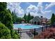 Community pool with water features, seating, and a shaded outdoor area at 115 Dunlavin Dr, Acworth, GA 30102