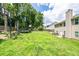 Large backyard with playset, trampoline, basketball hoop, and plenty of room to roam at 1849 Wanda Way, Ellenwood, GA 30294