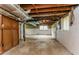 Unfinished basement with exposed ductwork and concrete floors, ready for customization at 4133 Conley Circle Cir, Conley, GA 30288