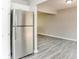 Modern kitchen features stainless steel appliances and leads to a spacious living area at 4133 Conley Circle Cir, Conley, GA 30288