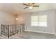 Open living area showcases hardwood floors, natural light, and a view of the backyard at 4133 Conley Circle Cir, Conley, GA 30288