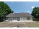 Rear exterior of the home with a patio and lawn at 1200 Martins Chapel Se Ln, Lawrenceville, GA 30045