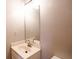 Bright bathroom with a vanity, sink, mirror, and toilet at 1200 Martins Chapel Se Ln, Lawrenceville, GA 30045