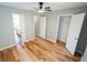 Bedroom showcasing hardwood floors and featuring closet and bathroom access at 1200 Martins Chapel Se Ln, Lawrenceville, GA 30045