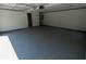 Spacious garage with finished walls and epoxy flooring at 1200 Martins Chapel Se Ln, Lawrenceville, GA 30045