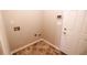 Inside the laundry room featuring hookups and a back door at 1200 Martins Chapel Se Ln, Lawrenceville, GA 30045
