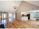 Spacious living room featuring hardwood floors, high ceilings, and an open floor plan concept at 1200 Martins Chapel Se Ln, Lawrenceville, GA 30045