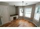 Office with a built-in desk, hardwood flooring, and natural light at 1200 Martins Chapel Se Ln, Lawrenceville, GA 30045