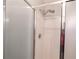 Walk-in shower with a glass enclosure and a showerhead with sleek hardware at 1200 Martins Chapel Se Ln, Lawrenceville, GA 30045