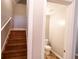 View of stairway and a half bathroom at 1200 Martins Chapel Se Ln, Lawrenceville, GA 30045